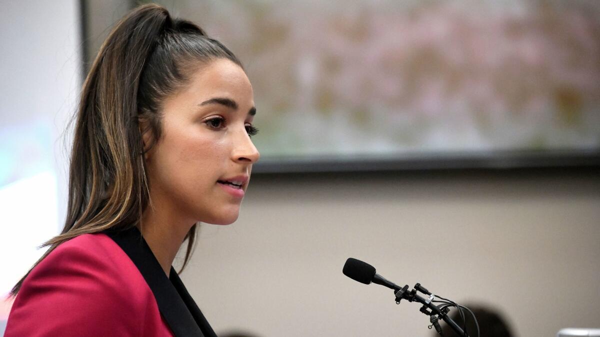 Olympic gold medalist Aly Raisman gives her victim impact statement in Lansing, Mich., during the fourth day of sentencing for former sports doctor Larry Nassar on Jan. 19.