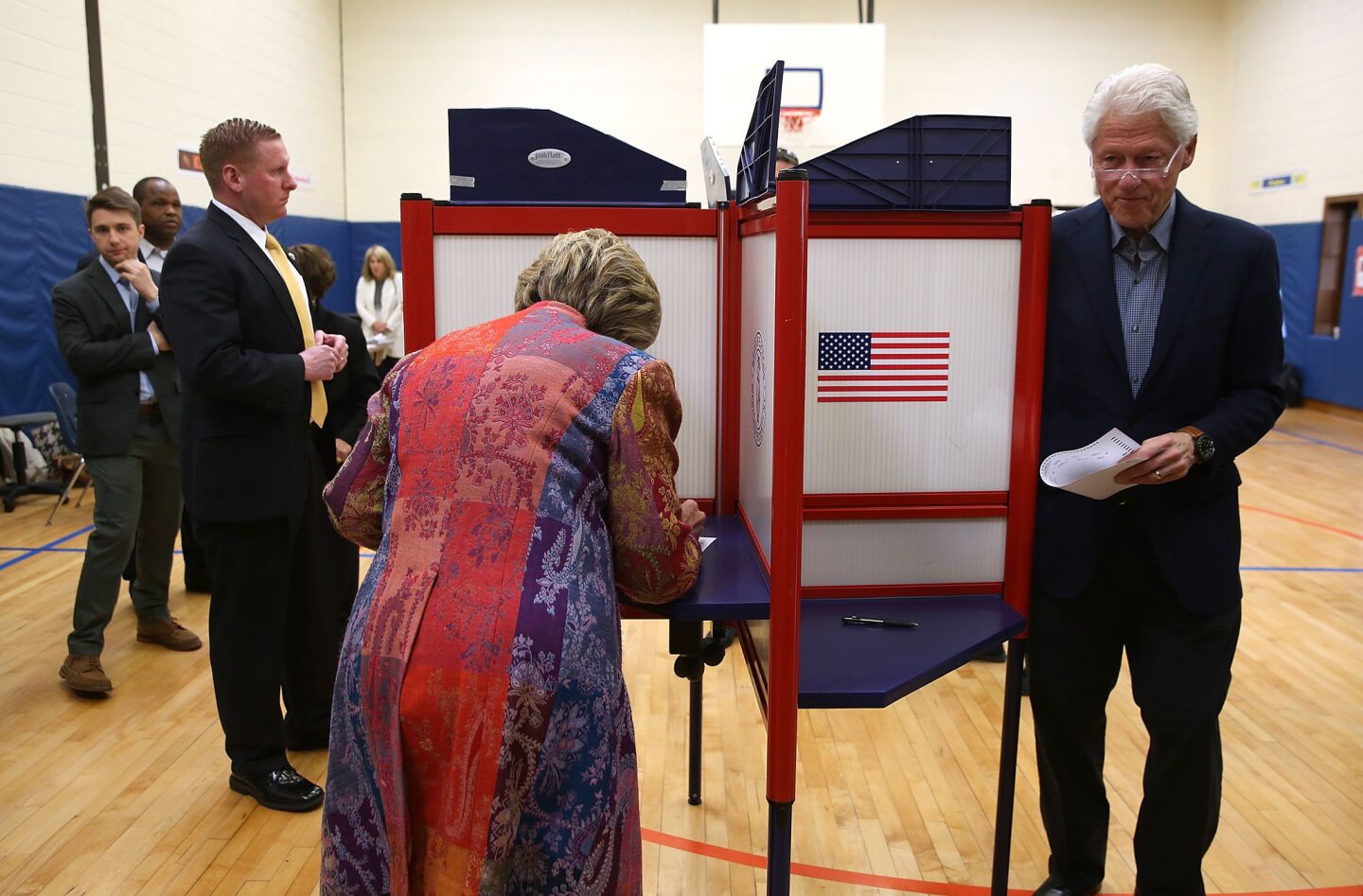 Hillary Clinton and her husband, former President Clinton, vote in Chappaqua, N.Y.