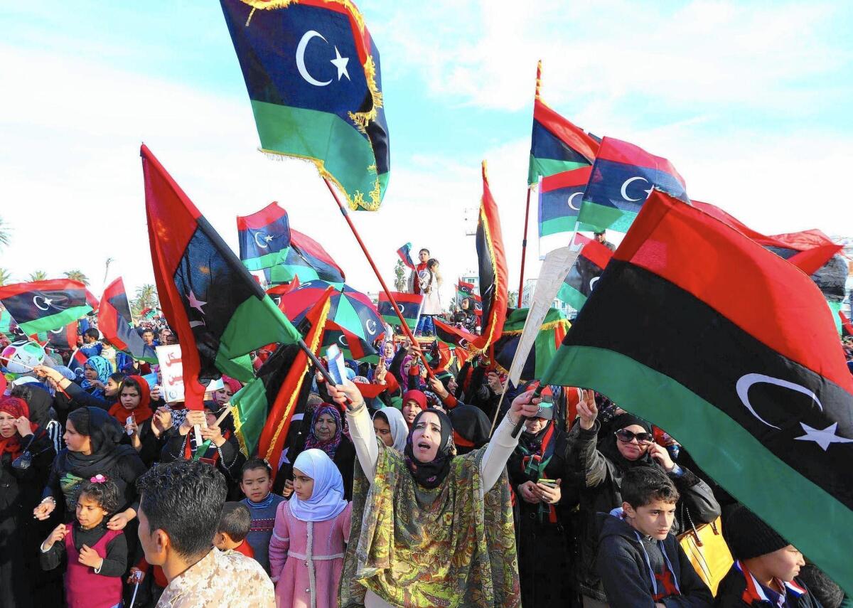 Libyans in Tripoli's landmark Martyrs Square on Feb. 17, 2015, celebrate the upcoming fourth anniversary of the Libyan revolution.