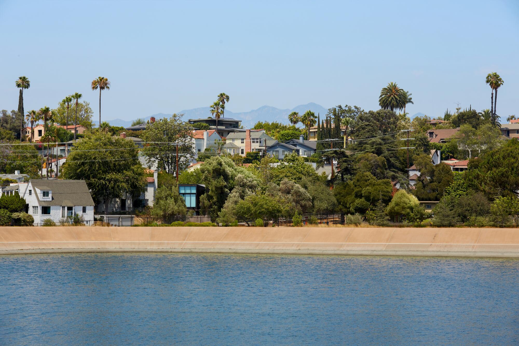 The Ivanhoe Vista House, seen as a speck on the suburban landscape, overlooks a reservoir