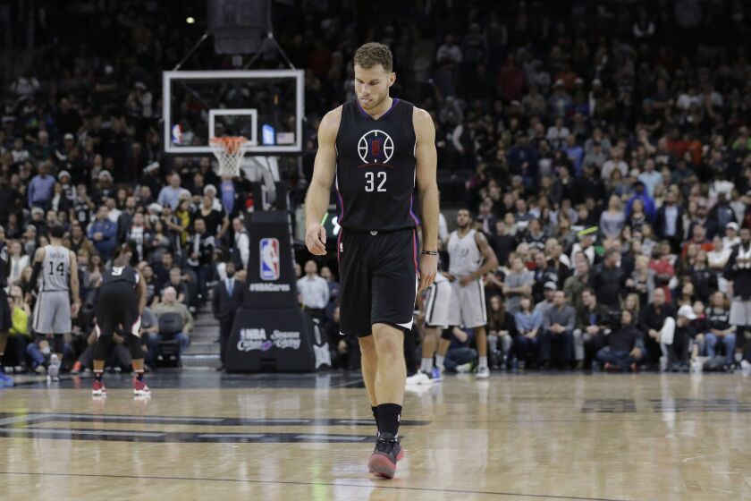 Clippers forward Blake Griffin walks up court during the final seconds of the team's 115-107 loss to San Antonio Spurs on Dec. 18.