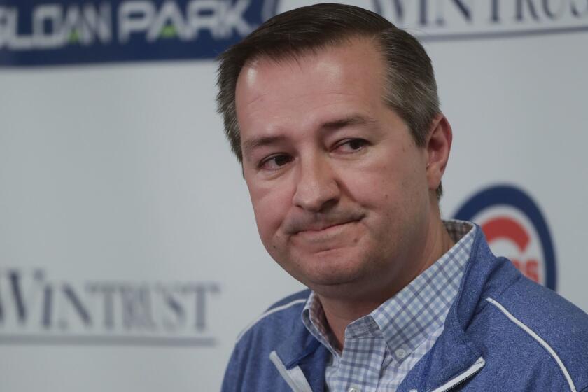 Chicago Cubs chairman Tom Ricketts answers questions during a news conference at a spring training baseball workout Monday, Feb. 18, 2019, in Mesa, Ariz. (AP Photo/Morry Gash)