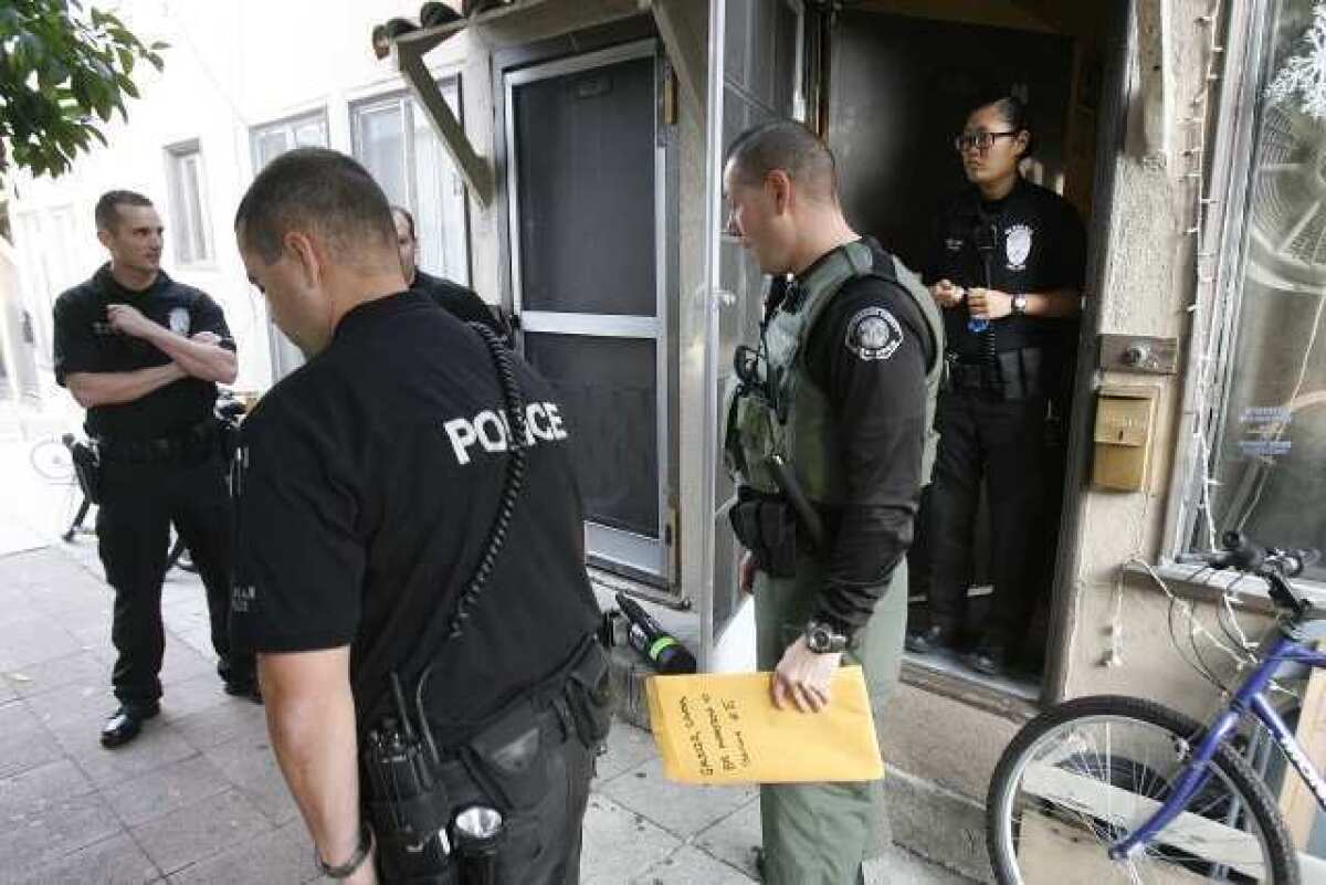 Glendale gang unit police officers conclude an investigation after searching an apartment where they intended on serving a gang injunction to a reputed Toonerville gang member in Glendale on Mariposa Avenue. The person they were interested in left for work earlier in the morning.
