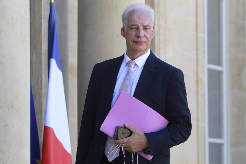 FILE - Alain Griset, who worked in the Finance Ministry and oversaw relations with small and medium-sized businesses, arrives for a meeting with labor union representatives and French President Emmanuel Macron at the Elysee Palace in Paris, Wednesday June 24, 2020. The junior finance minister quit the French government Wednesday Dec. 8, 2021 after being convicted of failing to declare all his wealth and income. The unusual conviction of a minister in office is a stain on the government of President Emmanuel Macron, who had promised a wholesale cleanup of political life when he was elected in 2017. (Ludovic Marin / POOL via AP, File)