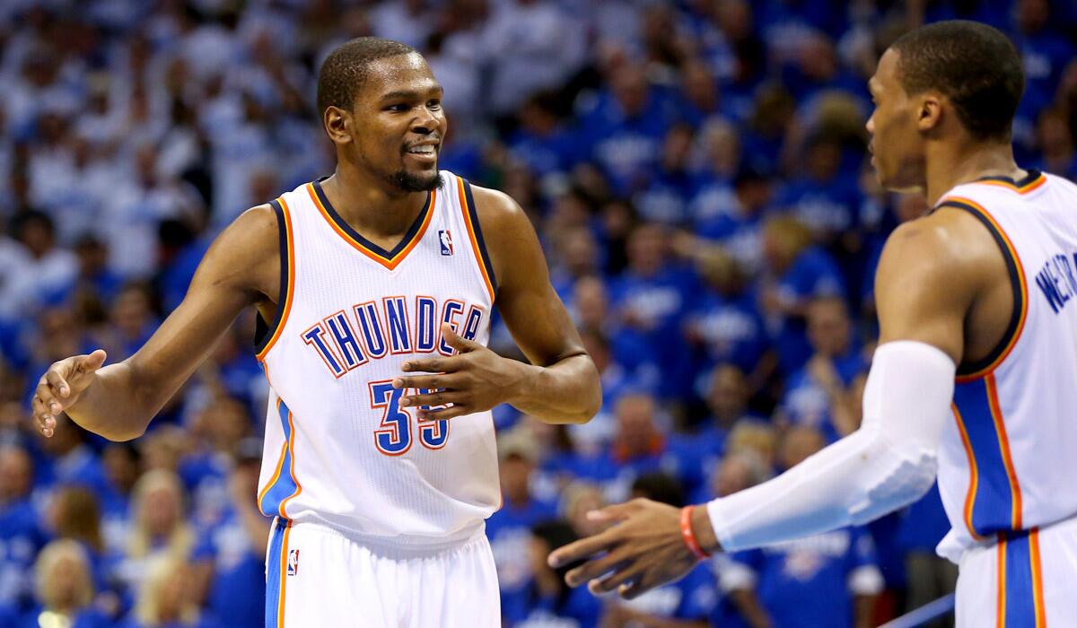 Forward Kevin Durant (35) and guard Russell Westbrook need to lead the Thunder to two victories of the San Antonio Spurs to advance to the NBA Finals.