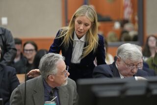 Gwyneth Paltrow speaks with retired optometrist Terry Sanderson,left, as she walks out of the courtroom following the reading of the verdict in their lawsuit trial, Thursday, March 30, 2023, in Park City, Utah. Paltrow won her court battle over a 2016 ski collision at a posh Utah ski resort after a jury decided Thursday that the movie star wasn’t at fault for the crash. (AP Photo/Rick Bowmer, Pool)