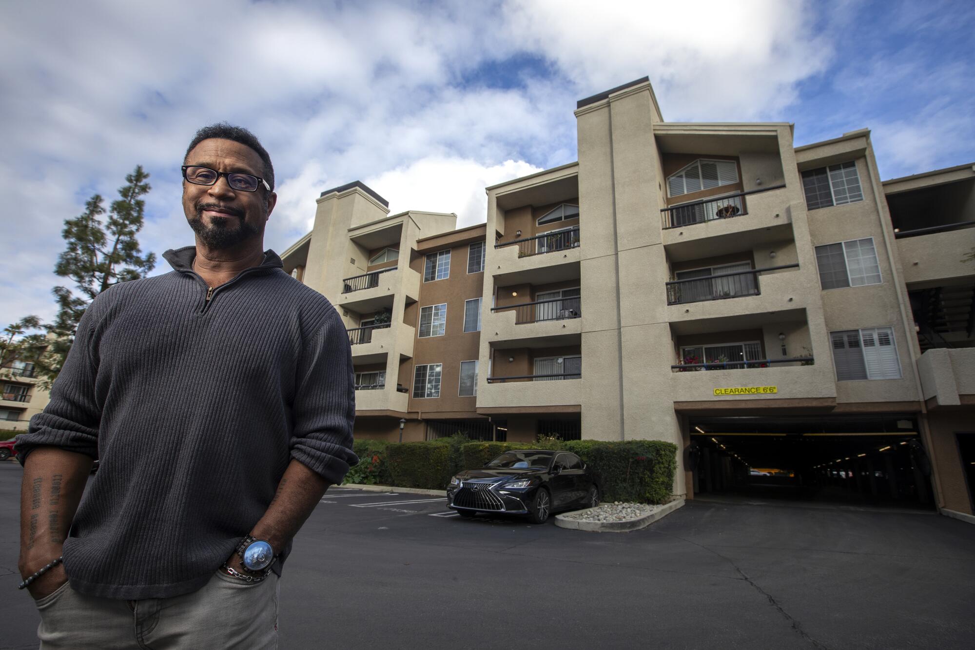 Tony Clark, a Woodland Hills resident for the last 20 years, is photographed at his condo complex on Canoga Avenue. 