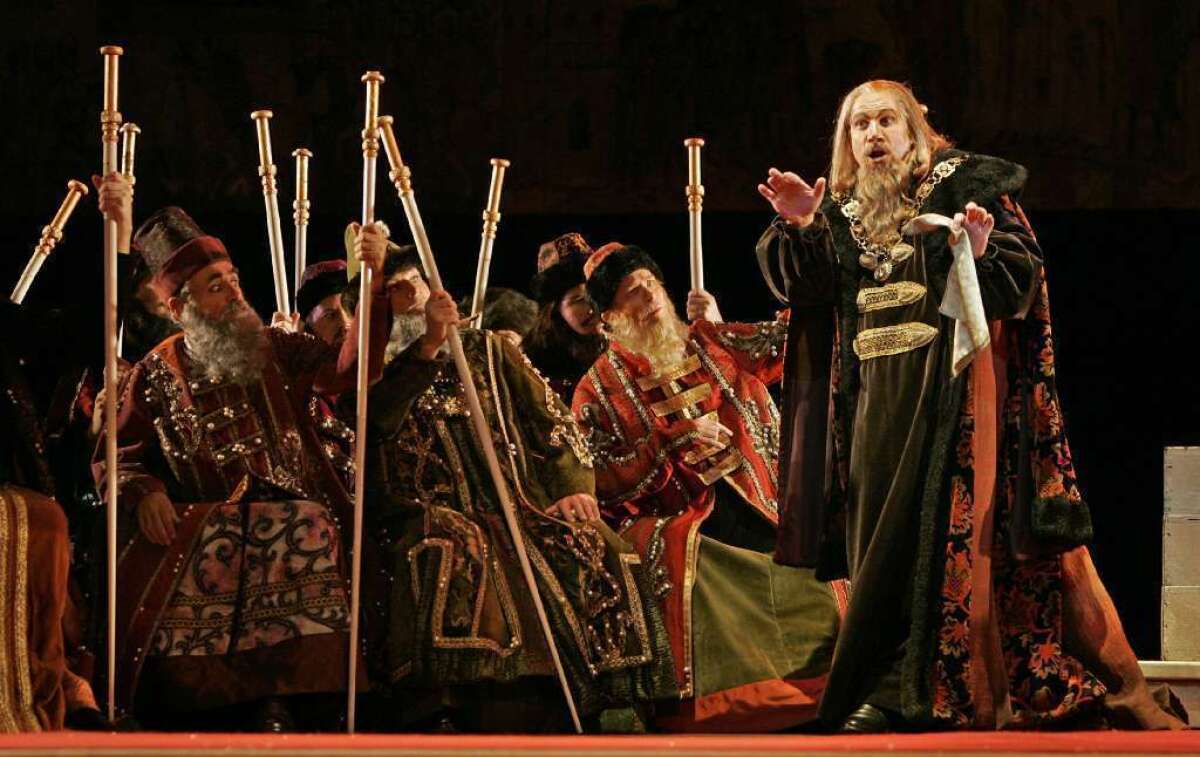 A scene from San Diego Opera's presentation of Mussorgsky's "Boris Godunov." Ferruccio Furlanetto plays the title role of the tormented Czar whose guilt over murdering the young heir to the throne drives him crazy and finally to his death.