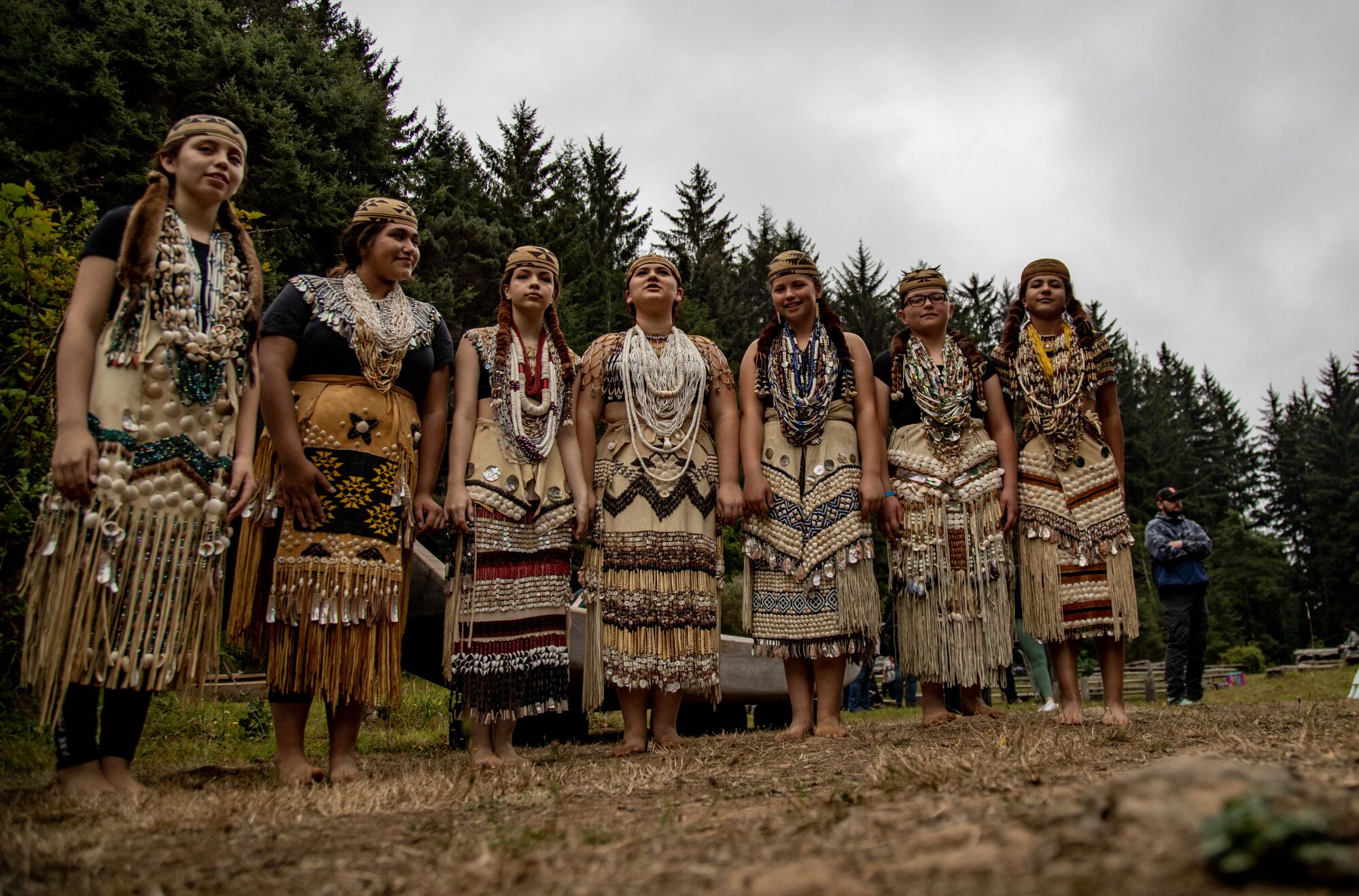 Young Native American girls dressed in brush dance regalia