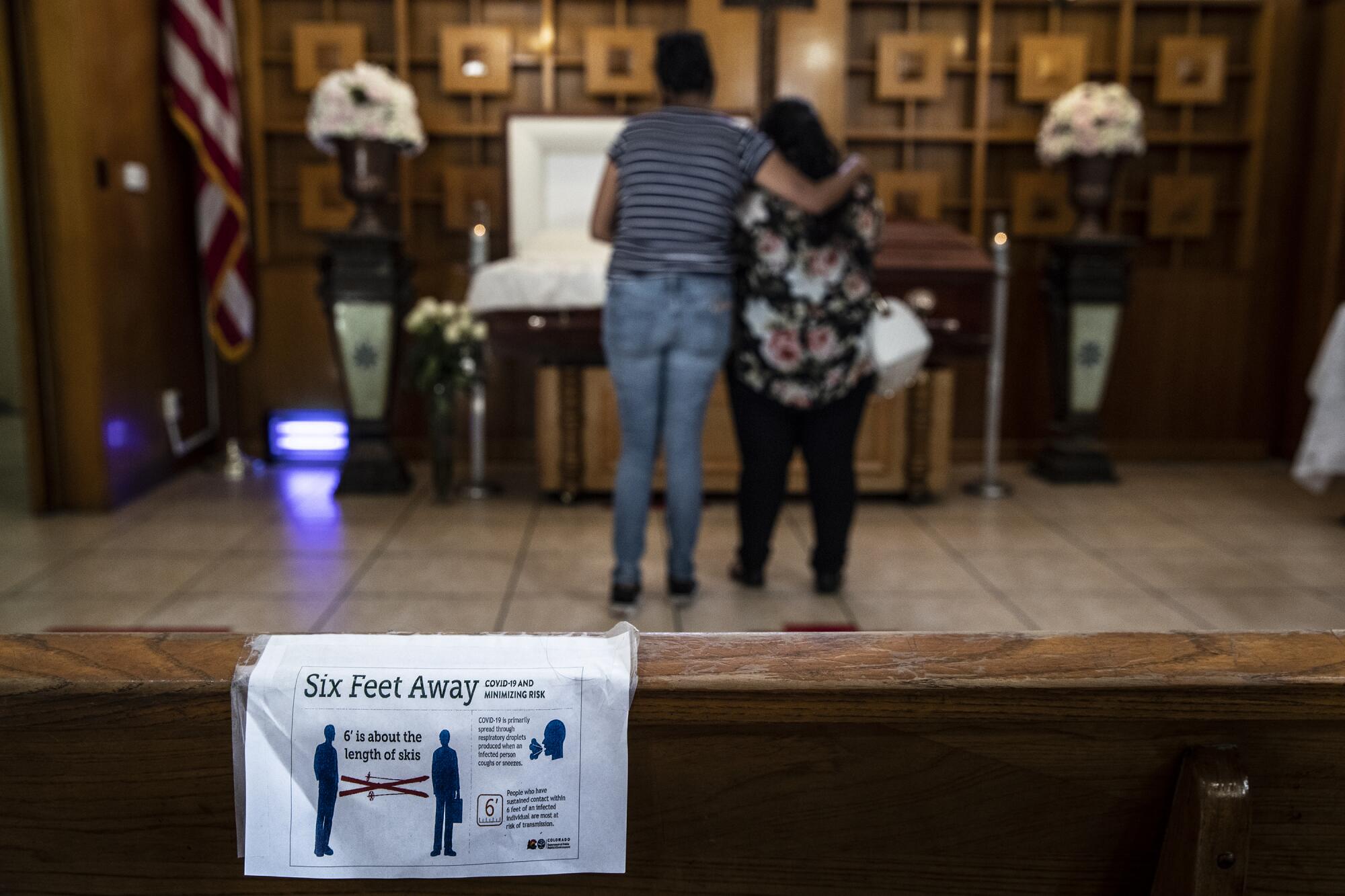 Social distancing sign at the Continental Funeral Home.