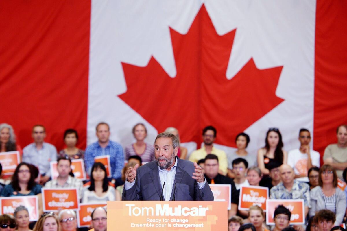Tom Mulcair, the leader of Canada's New Democrats party, speaks to supporters at a campaign rally in Vancouver on Aug. 9.