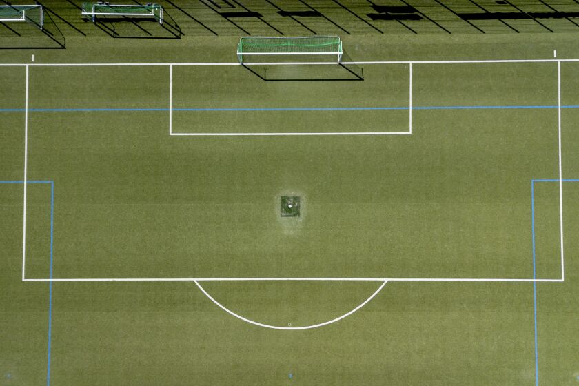 The pitch of a soccer club is pictured in Frankfurt, Germany, Tuesday, May 30, 2023. A 15-year-old soccer player has died after suffering severe brain injuries during a post-match brawl with an opposing team at an international youth tournament in Germany over the weekend, officials said Wednesday. A 16-year-old from a French team was jailed pending further investigation by a judge in Frankfurt, where the match with a team from Berlin took place on Sunday. (AP Photo/Michael Probst)