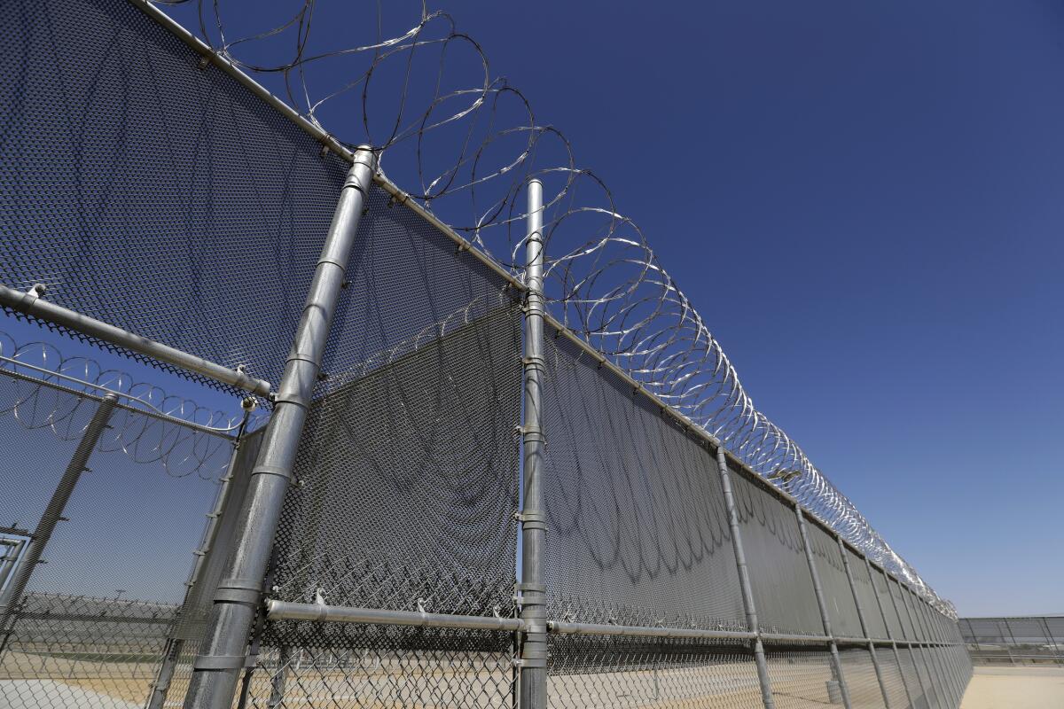 Fencing around the U.S. Immigration and Enforcement Processing Center in Adelanto in San Bernardino County.
