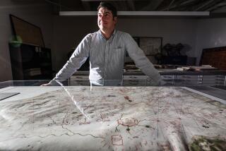 LaJolla, CA, Tuesday, July 25, 2023 - Alex Clauson, pictured, and Barry Ruderman, who buy and sell antique maps in La Jolla, found a rare map-a 14th Century "Rex Tholomeus" Portolan Chart-at an estate sale for Gordon Getty. They bought the map for about $250,000, but found out that it's really worth $7.5 million. The map is said to be the oldest located in the United States. (Robert Gauthier/Los Angeles Times)