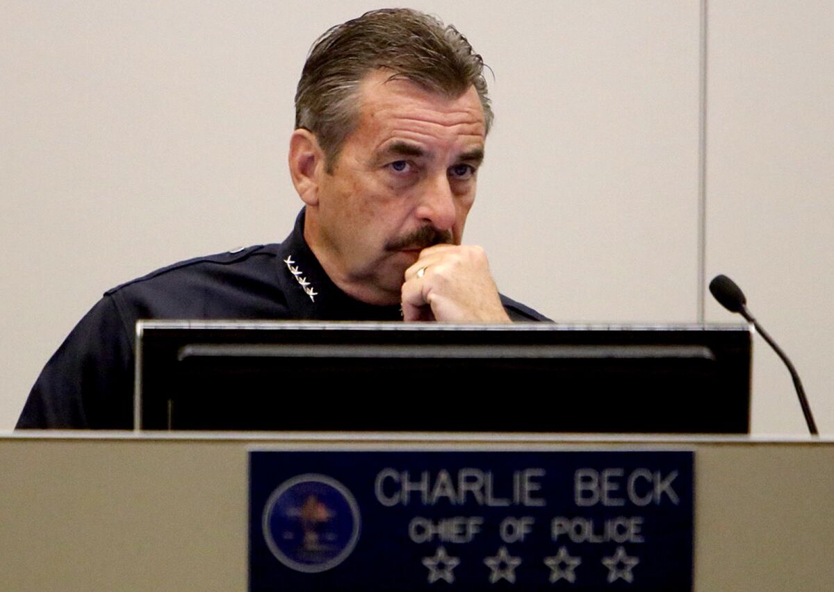 LAPD Chief Charlie Beck attends Tuesday's meeting of the Los Angeles Police Commission, which appointed him to a second five-year term as head of the city's Police Department.