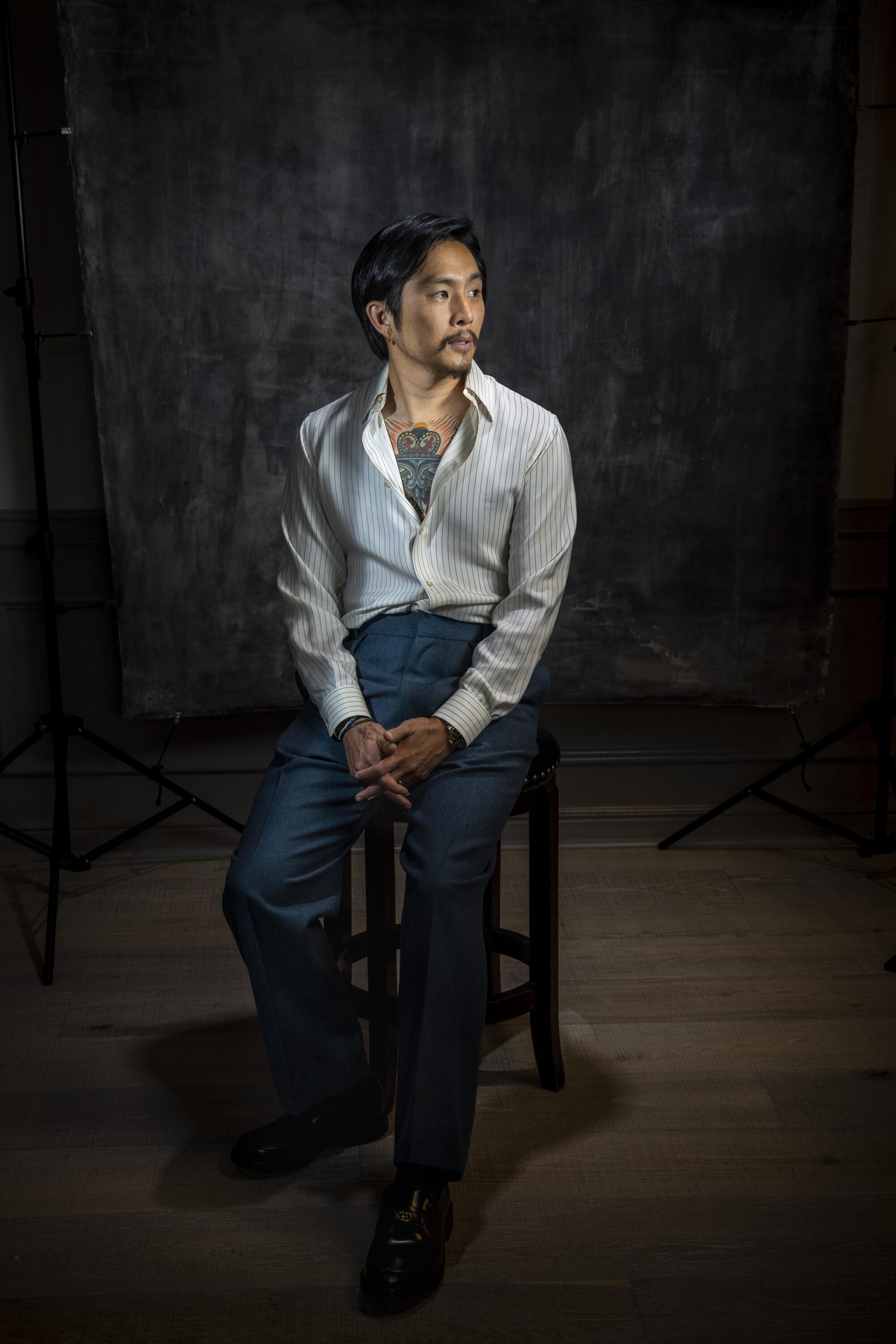 Filmmaker Justin Chon in a photo studio.