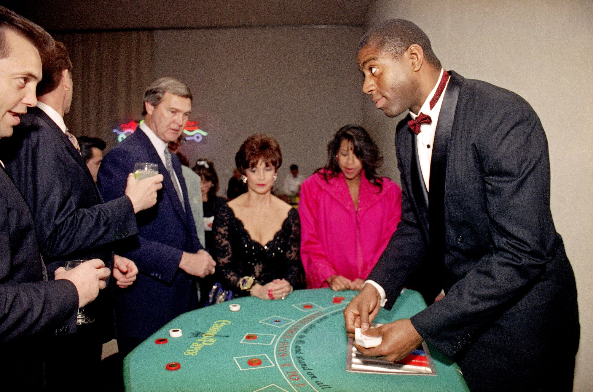 Magic Johnson deals blackjack