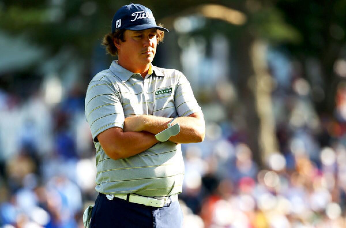Jason Dufner waits on the 18th green Friday during the second round of the PGA Championship before attempting a birdie putt that could have given him a major record for a round at 62. He two-putted for a 63.