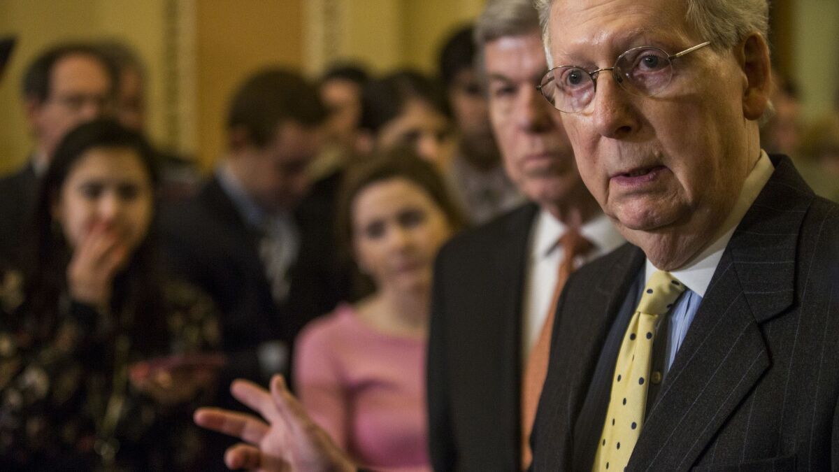 Senate Majority Leader Mitch McConnell (R-KY) speaks during a news conference following a weekly policy luncheon in Washington on April 2.