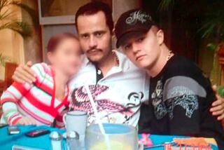 Nemesio Ruben Oseguera Cervantes a.ka. El Mencho, reputed leader of the Jalisco New Generation cartel, with his son Ruben Oseguera Gonzalez, known as El Menchito, in an evidence photo used by federal prosecutors.