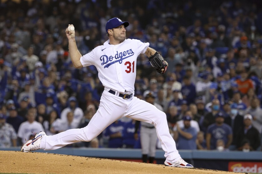 Max Scherzer delivers for the Dodgers during Game 3 of the NLDS against the San Francisco Giants on Oct. 11.