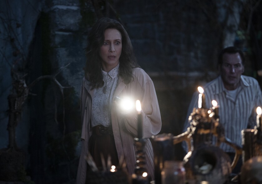 This image released by Warner Bros. Entertainment shows Vera Farmiga, left, and Patrick Wilson in a scene from "The Conjuring: The Devil Made Me Do It." (Ben Rothstein/Warner Bros. Entertainment via AP)