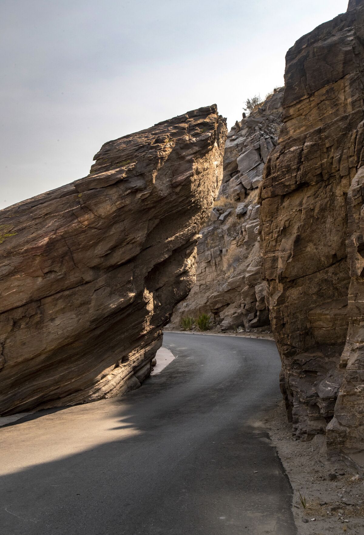 Split Rock provides a narrow opening for cars to drive through on the way to Palm Canyon inside the Indian Canyons.