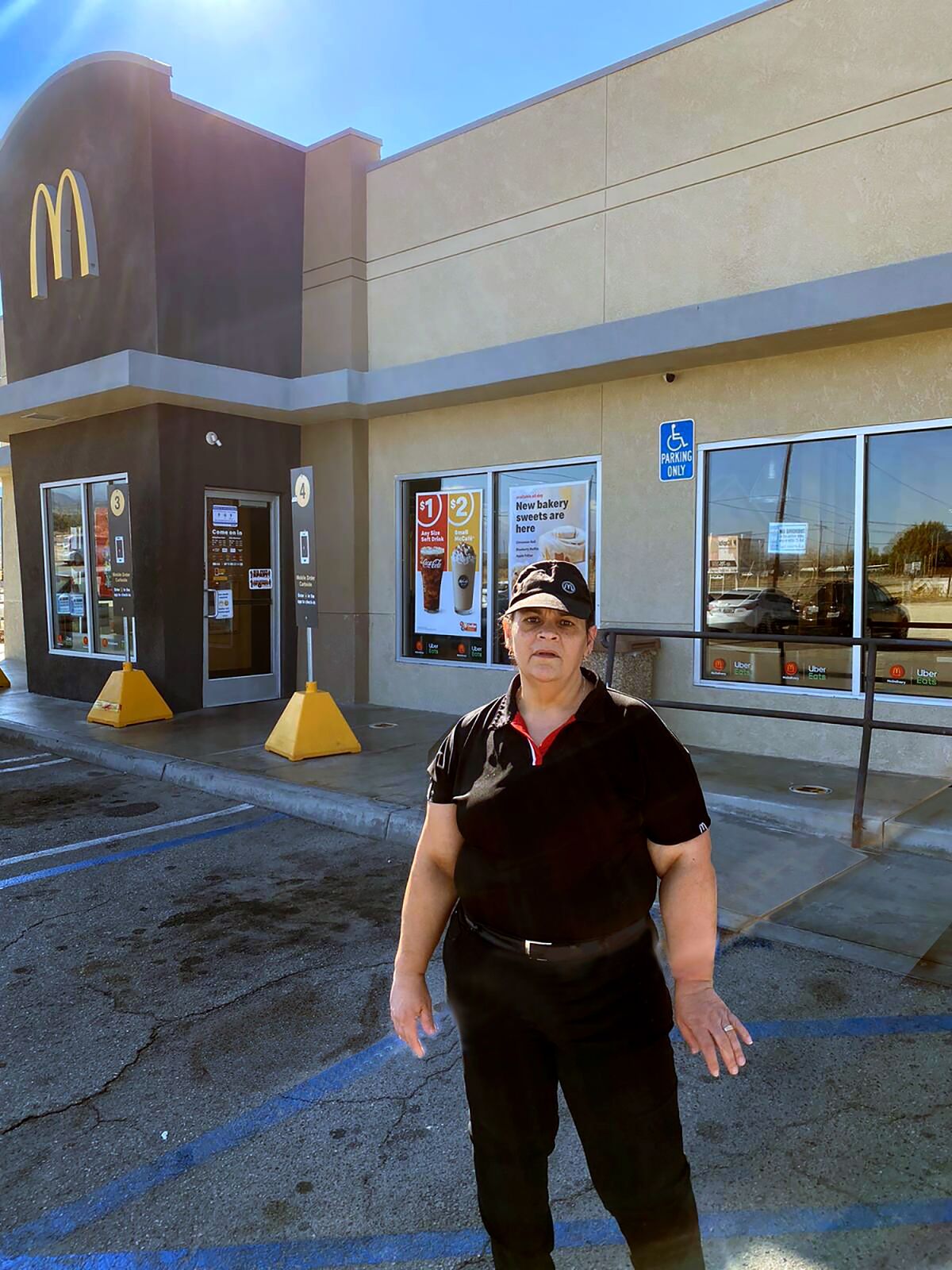 Imelda Rosales at the McDonald's outlet where she has worked for 11 years,  in Littlerock, Calif. 