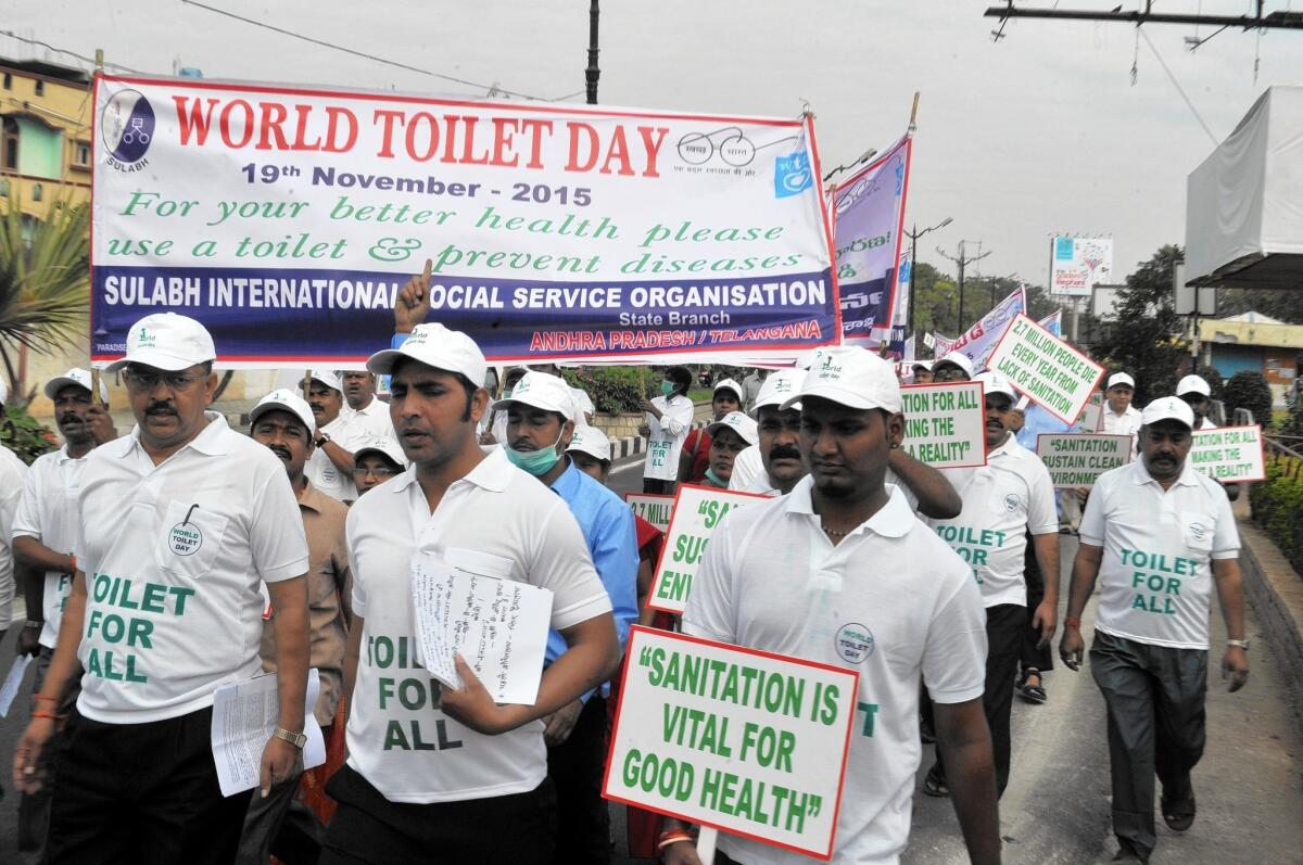 Participants rally for improved sanitation on World Toilet Day in Hyderabad, India.