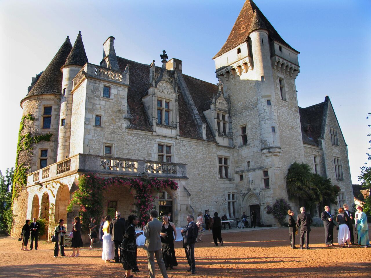 The late Gothic/early Renaissance castle was built in 1489 by François de Caumont for his wife, Claude de Cardaillac. The medallions honoring him on the chimney of the small dining room were added by a later owner, Charles Claverie, who began a full-scale restoration in 1900. -- Susan Spano