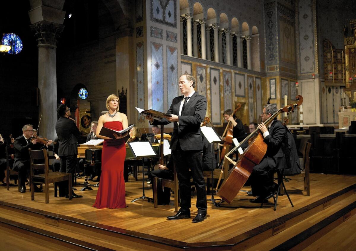 Soloists Alice Teyssier and Ryland Angel perform the parts of Maria Maddalena and Maria Cleofe during the Bach Collegium San Diego at St. John's Episcopal Church in Los Angeles on April 18, 2015.