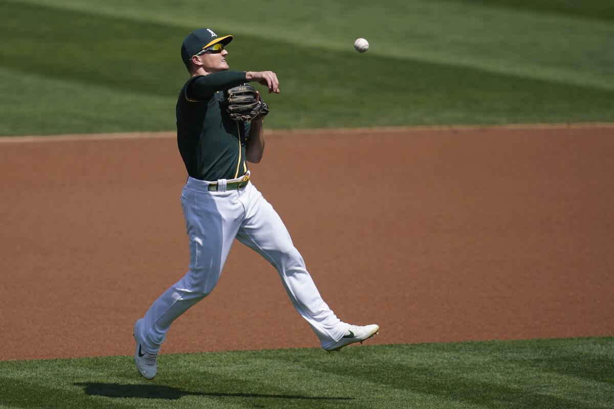 Matt Chapman of the Oakland Athletics fields during the game