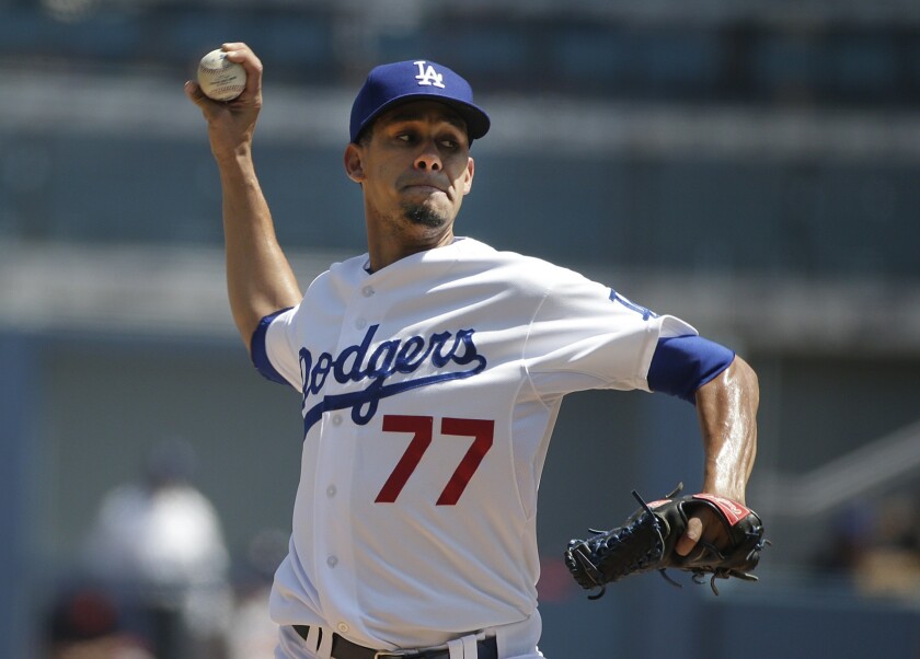 Carlos Frias throws against the Washington Nationals at Dodger Stadium on Sept. 3.