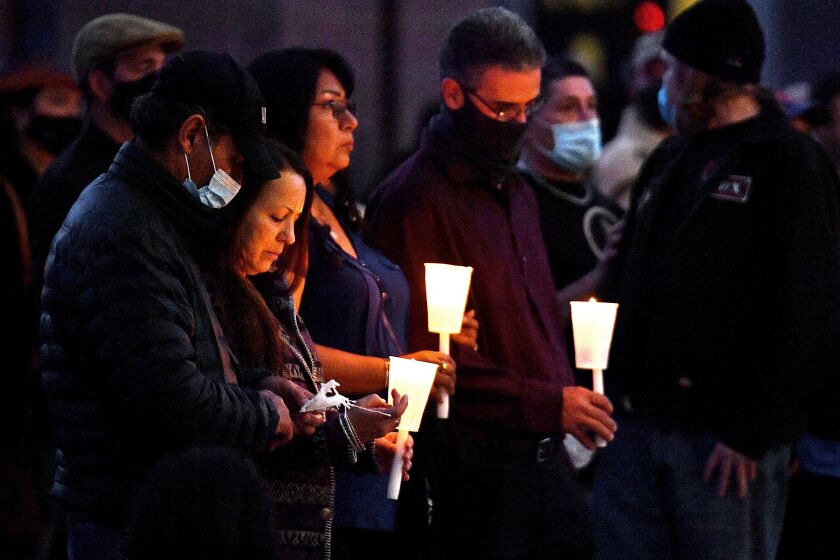 ALBUQUERQUE, NEW MEXICO - OCTOBER 23: People hold candles as they attend a vigil held to honor cinematographer Halyna Hutchins at Albuquerque Civic Plaza on October 23, 2021 in Albuquerque, New Mexico. Hutchins was killed on set while filming the movie "Rust" at Bonanza Creek Ranch near Santa Fe, New Mexico on October 21, 2021. The film's star and producer Alec Baldwin discharged a prop firearm that hit Hutchins and director Joel Souza. (Photo by Sam Wasson/Getty Images)