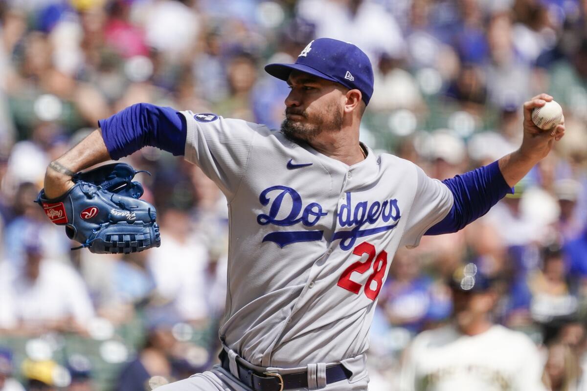 Dodgers starting pitcher Andrew Heaney delivers during the first inning against the Milwaukee Brewers.