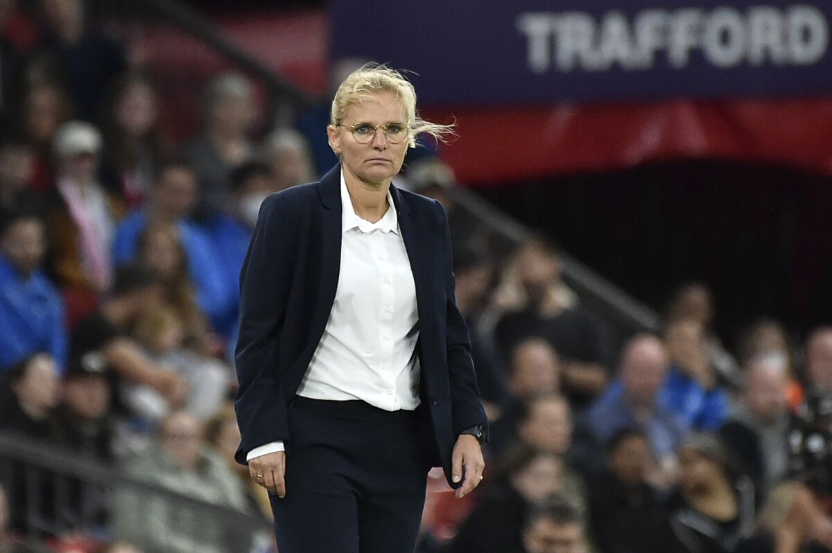 England's manager Sarina Wiegman stands by the touchline during the Women Euro 2022 soccer match between England and Austria at Old Trafford in Manchester, England, Wednesday, July 6, 2022. (AP Photo/Rui Vieira)