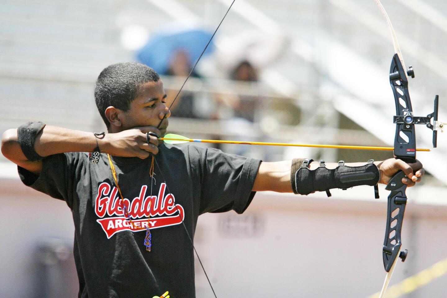 Glendale's Asad Landery, 15, competes in an archery competition, which took place at Glendale High School on Saturday, May 5, 2012.