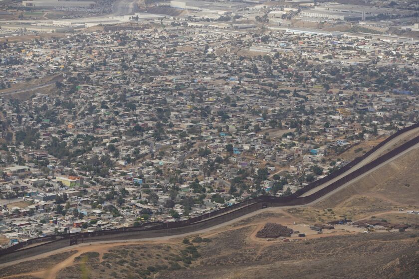 San Diego, California - June 08: United States Border Patrol tours an area where larger number of noncitizens are making multiple border crossing attempts. To the south of the border fence is Tijuana a view from Otay Mountain on Tuesday, June 8, 2021 in San Diego, California (Alejandro Tamayo / The San Diego Union-Tribune)