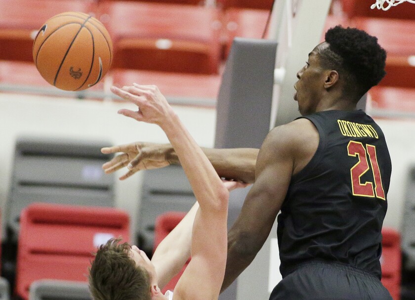 USC forward Onyeka Okongwu, right, blocks a shot by Washington State forward Aljaz Kunc.