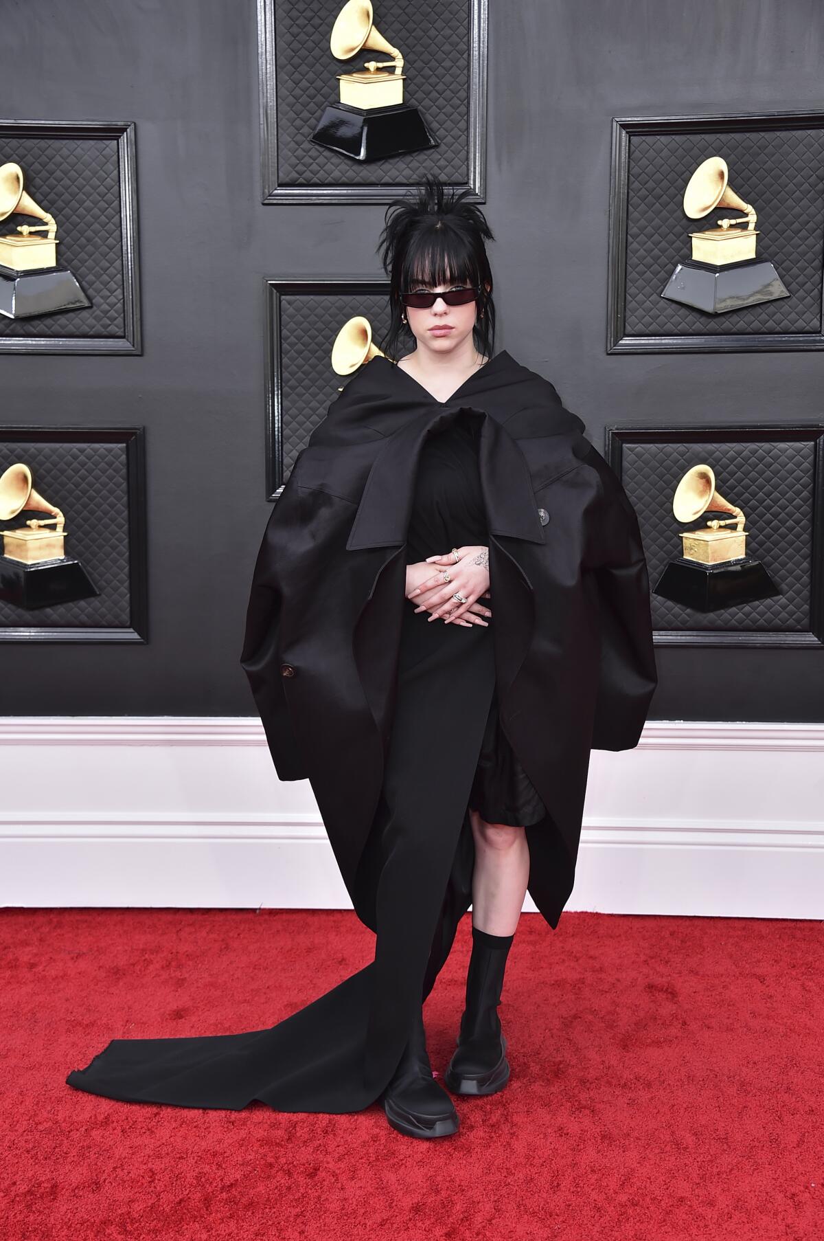 Billie Eilish arrives at the 64th Grammy Awards.