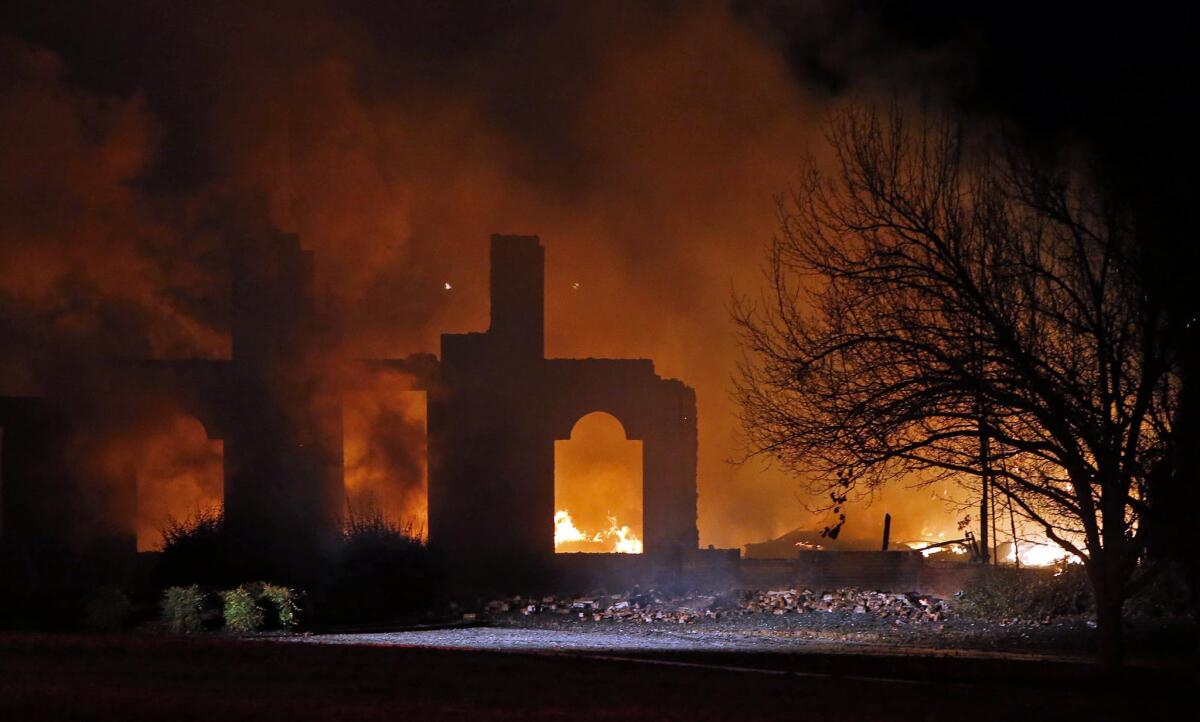 Little remains of Rolando McClain's house Monday night after a fire gutted the $1.5 million mansion in Tuscaloosa, Ala.