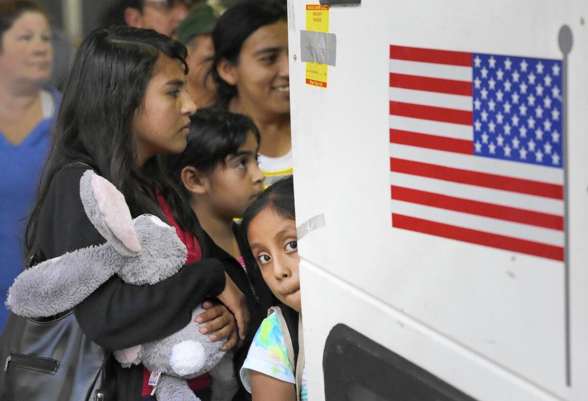 Immigrants from El Salvador and Guatemala who entered the country illegally board a bus after being released from a family detention center in San Antonio in 2015.