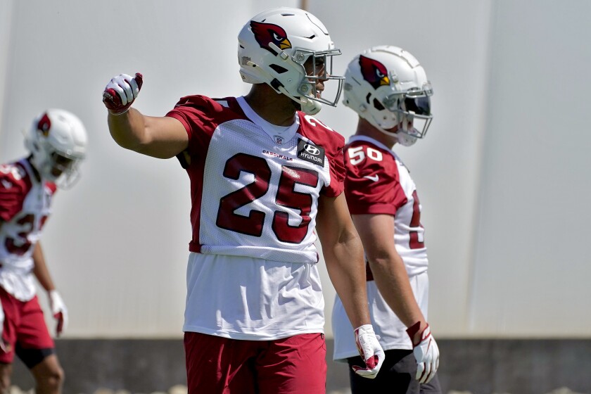 Arizona Cardinals' Zaven Collins (25) works out during an NFL football rookie minicamp, Friday, May 14, 2021, in Tempe, Ariz. (AP Photo/Matt York)