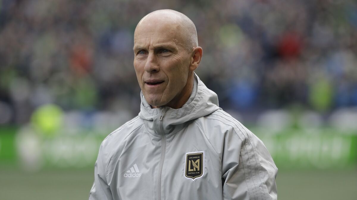 LAFC head coach Bob Bradley walks on the pitch before a match against the Seattle Sounders in 2018 in Seattle.