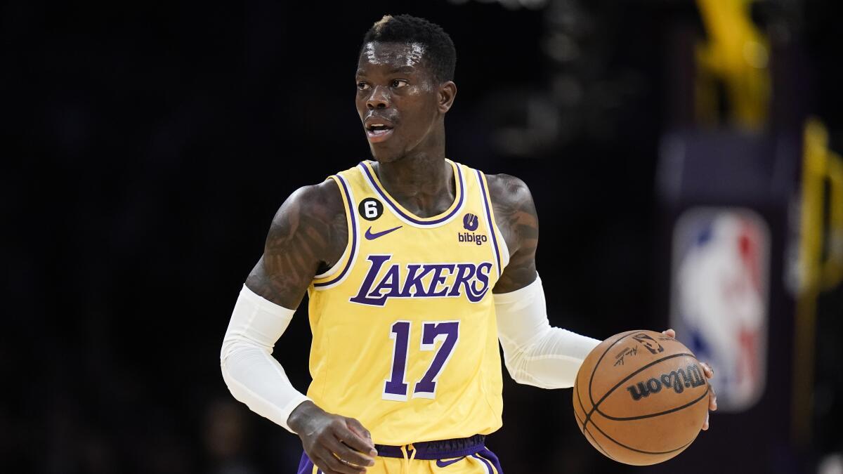 Los Angeles Lakers' Dennis Schroder dribbles the ball 