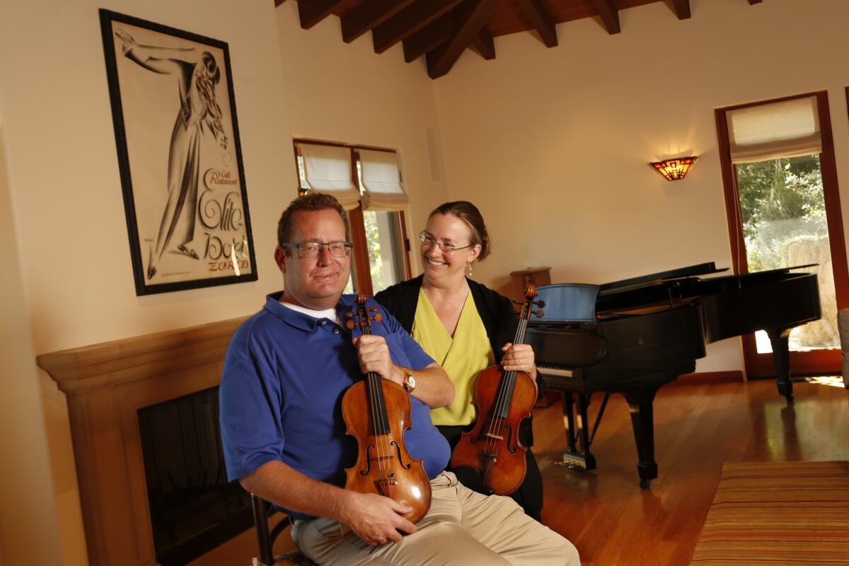 Peter and Sarah Coade Mandell have helped talented young musicians rise even further with their loans of fine violins, violas and cellos.