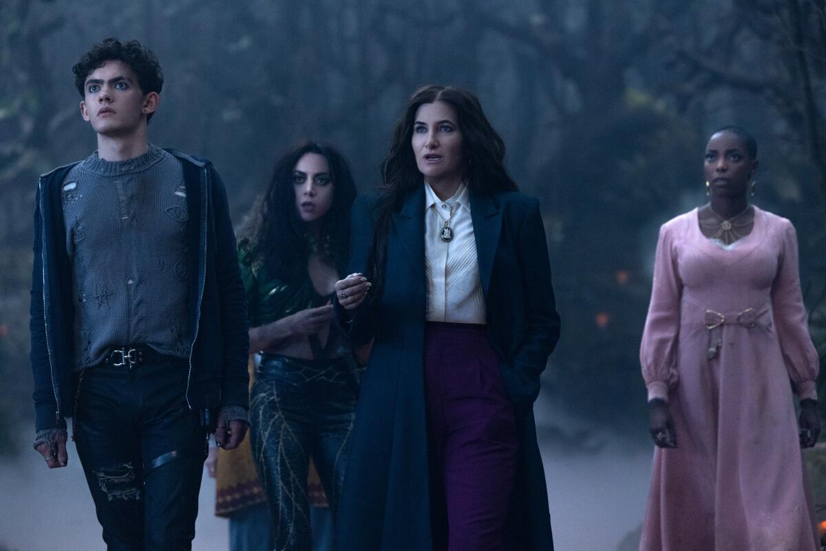 Joe Locke, Aubrey Plaza, Kathryn Hahn and Sasheer Zamata in a misty forest in "Agatha from the beginning."