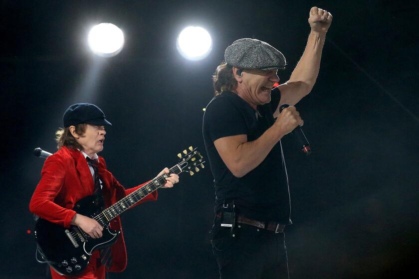 Singer Brian Johnson and guitarist Angus Young front AC/DC at Coachella in 2015.