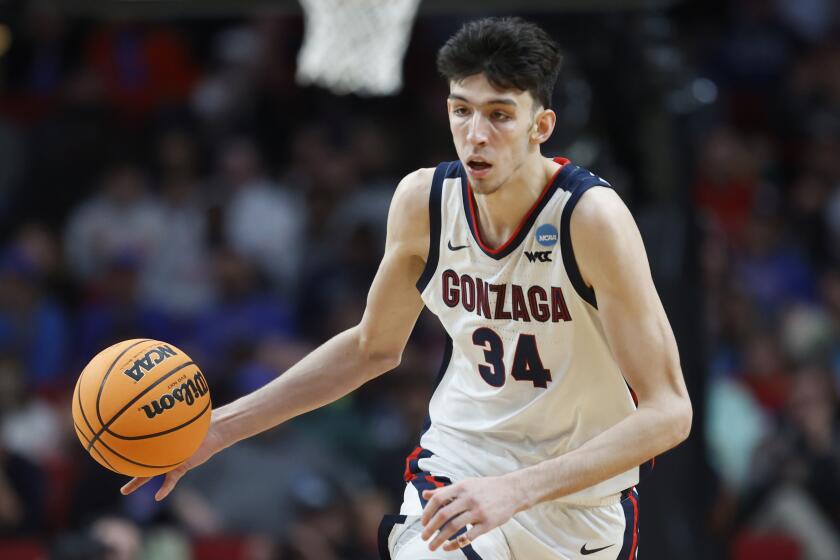 FILE - Gonzaga center Chet Holmgren (34) moves the ball against Georgia State during the second half of a first round NCAA college basketball tournament game, Thursday, March 17, 2022, in Portland, Ore. Houston, Detroit and Orlando share the best odds to win the draft lottery on Tuesday, May 17, 2022, and the No. 1 pick in the NBA draft. All three are already loaded with young players, even before the possibility of adding someone like Chet Holmgren, Paolo Banchero or Jabari Smith. (AP Photo/Craig Mitchelldyer, File)