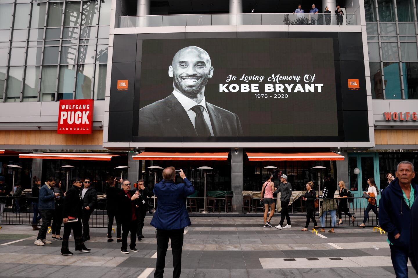 A screen at L.A. Live on Sunday displays an image of Lakers legend Kobe Bryant following his death in a helicopter crash in Calabasas.